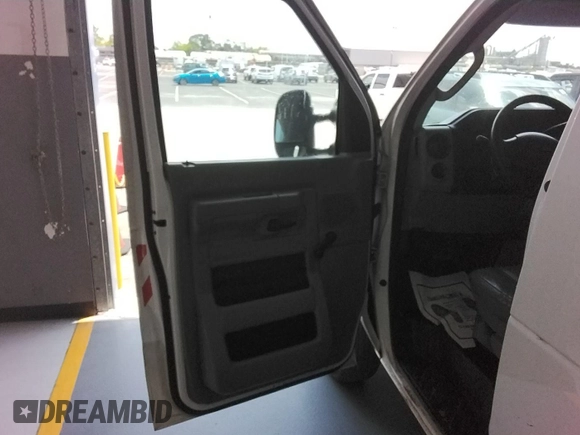 2014 Ford Econoline Cargo Commercial with VIN 1FTNE1EW4EDA41208, listed as a IAAI auction lot 42294601 with 229,483 mi miles and . Bid and sale history available at DreamBid. Image 1.