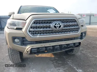2017 Toyota Tacoma SR5 with VIN 5TFCZ5AN7HX097307, listed as a IAAI auction lot 42337528 with 98,000 mi miles and . Bid and sale history available at DreamBid. Image 6.