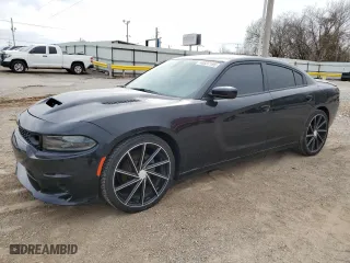 2019 Dodge Charger SXT with VIN 2C3CDXBG7KH599597, listed as a Copart auction lot 48837195 with 71,475 mi miles and Salvage Title. Bid and sale history available at carsss.com. Image 1.