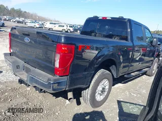 2021 Ford Super Duty F-250 SRW XL with VIN 1FT7W2B61MEE02841, listed as a IAAI auction lot 41454119 with 54,703 mi miles. Bid and sale history available at carsss.com. Image 4.
