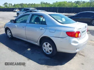 2009 Toyota Corolla with VIN 1NXBU40E99Z100681, listed as a IAAI auction lot 41973116 with 119,744 mi miles. Bid and sale history available at carsss.com. Image 3.