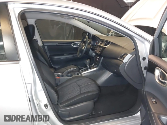 2018 Nissan Sentra S with VIN 3N1AB7AP0JY227296, listed as a IAAI auction lot 41950972 with 57,984 mi miles and . Bid and sale history available at DreamBid. Image 5.