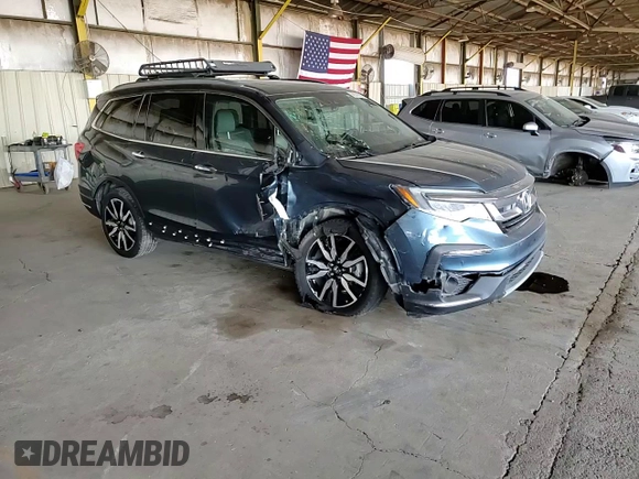 2022 Honda Pilot Elite z VIN 5FNYF6H04NB000987, wystawiony jako Copart lot #58584505 z przebiegiem 73 489 mil mil oraz Szkoda całkowita • Salvage title. Historia ofert i sprzedaży dostępna na DreamBid. Obrazek 14.