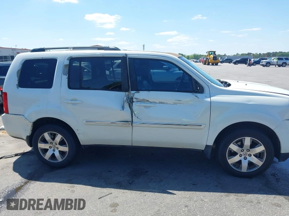 2015 Honda Pilot Touring with VIN 5FNYF3H92FB020766, listed as a IAAI auction lot 41983315 with 201,086 mi miles. Bid and sale history available at carsss.com. Image 13.