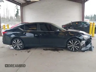 2019 Nissan Altima 2.5 SR with VIN 1N4BL4CV8KC245537, listed as a IAAI auction lot 41808203 with 101,419 mi miles. Bid and sale history available at carsss.com. Image 13.