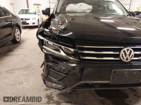 2021 Volkswagen Tiguan SE with VIN 3VV2B7AXXMM034880, listed as a IAAI auction lot 41979636 with 34,490 mi miles and . Bid and sale history available at DreamBid. Image 6.