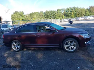 2013 Volkswagen Passat TDI SEL Premium with VIN 1VWCN7A33DC031549, listed as a IAAI auction lot 40313029 with 104,184 mi miles. Bid and sale history available at carsss.com. Image 13.