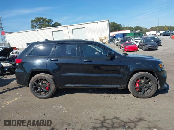 2017 Jeep Grand Cherokee SRT with VIN 1C4RJFDJ2HC696025, listed as a IAAI auction lot 41863274 with 126,949 mi miles. Bid and sale history available at carsss.com. Image 13.