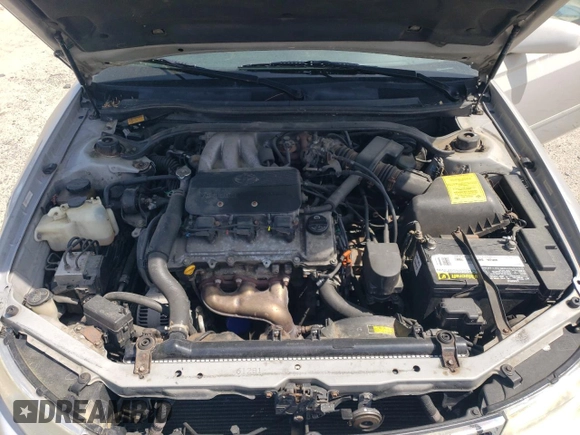 2001 Toyota Solara SE z VIN 2T1CF28P71C542504, wystawiony jako Copart lot #54675935 z przebiegiem 181 793 mil mil oraz Szkoda całkowita • Salvage title. Historia ofert i sprzedaży dostępna na DreamBid. Obrazek 11.