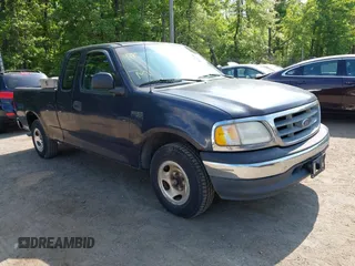 2000 Ford F-150 XL with VIN 1FTZX1723YNB00043, listed as a IAAI auction lot 42215601 with Not provided miles and . Bid and sale history available at DreamBid. Image 1.