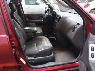 2003 Ford Escape XLT Popular 2 with VIN 1FMCU93173KA52806, listed as a IAAI auction lot 41696250 with 138,338 mi miles. Bid and sale history available at carsss.com. Image 5.