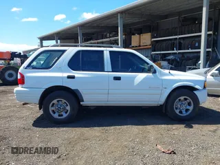 2000 Isuzu Rodeo S with VIN 4S2CK58W6Y4355597, listed as a IAAI auction lot 41775764 with 122,776 mi miles. Bid and sale history available at carsss.com. Image 13.