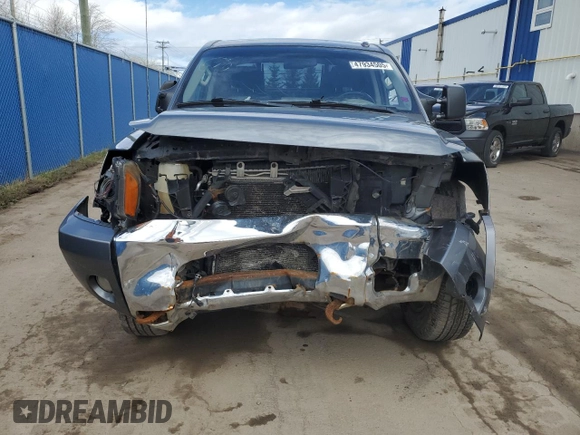 2014 Nissan Titan S with VIN 1N6AA0ECXEN515423, listed as a Copart auction lot 47934505 with 208,900 mi miles and Salvage Title. Bid and sale history available at DreamBid. Image 5.