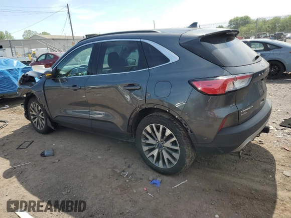 2020 Ford Escape Titanium с VIN 1FMCU9J99LUC63261, выставлен на аукционе Copart как лот 56312955 с пробегом Не указан миль и Списание • Salvage title. История ставок и продаж доступна на DreamBid. Изображение 2.
