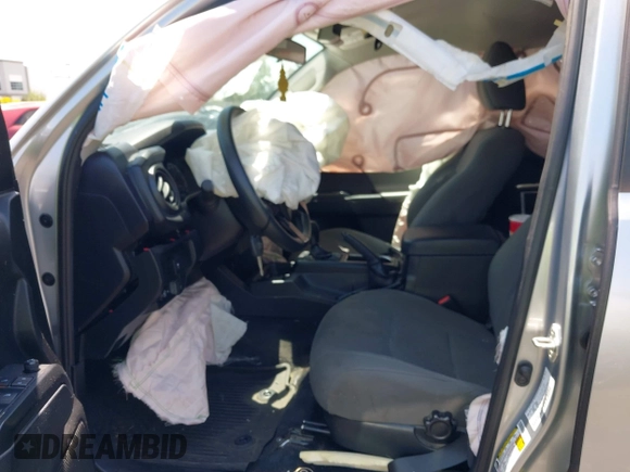 2022 Toyota Tacoma SR with VIN 3TYAX5GN4NT037625, listed as a IAAI auction lot 42382411 with 49,703 mi miles and . Bid and sale history available at DreamBid. Image 5.