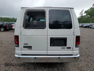 2009 Ford Econoline Passenger XL with VIN 1FBNE31L49DA74498, listed as a Copart auction lot 56381945 with 95,695 mi miles and Salvage title. Bid and sale history available at DreamBid. Image 6.