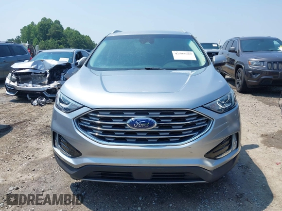 2020 Ford Edge SEL with VIN 2FMPK3J98LBA83828, listed as a IAAI auction lot 42585669 with 60,704 mi miles and . Bid and sale history available at DreamBid. Image 13.