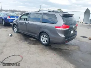 2014 Toyota Sienna LE AAS with VIN 5TDKK3DC8ES465171, listed as a IAAI auction lot 41844285 with 76,738 mi miles. Bid and sale history available at carsss.com. Image 3.