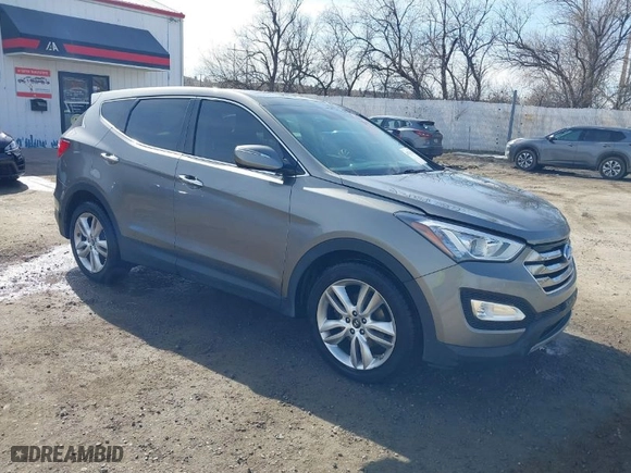 2013 Hyundai Santa Fe 2.0T Sport with VIN 5XYZWDLA1DG003779, listed as a IAAI auction lot 41761431 with 127,895 mi miles. Bid and sale history available at carsss.com. Image 1.