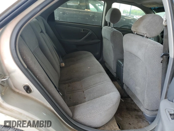 2001 Toyota Camry CE z VIN 4T1BG22K11U784435, wystawiony jako Copart lot #57150025 z przebiegiem 32 777 mil mil oraz Czysty tytuł • Clean title. Historia ofert i sprzedaży dostępna na DreamBid. Obrazek 10.
