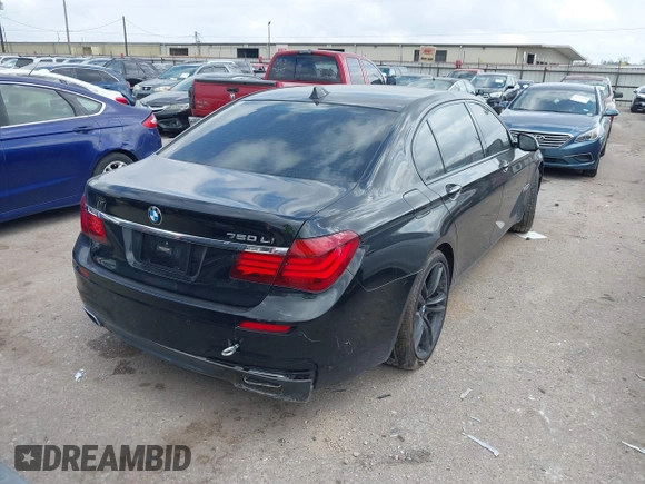 2013 BMW 7 Series 750Li with VIN WBAYE8C55DD133178, listed as a IAAI auction lot 41509860 with 90,841 mi miles and . Bid and sale history available at DreamBid. Image 4.