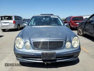 2004 Mercedes-Benz E-Class 5.0L with VIN WDBUF70JX4A479530, listed as a Copart auction lot 68093214 with 165,986 mi miles and Clean Title. Bid and sale history available at carsss.com. Image 5.