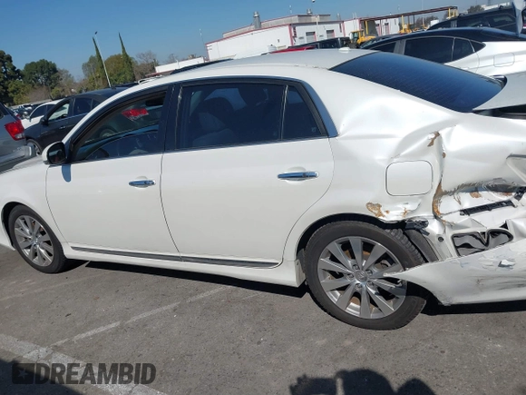 2012 Toyota Avalon with VIN 4T1BK3DB1CU469574, listed as a IAAI auction lot 41633881 with 128,425 mi miles and . Bid and sale history available at DreamBid. Image 14.