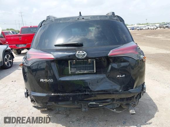 2018 Toyota RAV4 XLE z VIN 2T3WFREV4JW495379, wystawiony jako IAAI lot #42406849 z przebiegiem 132 126 mil mil oraz . Historia ofert i sprzedaży dostępna na DreamBid. Obrazek 17.