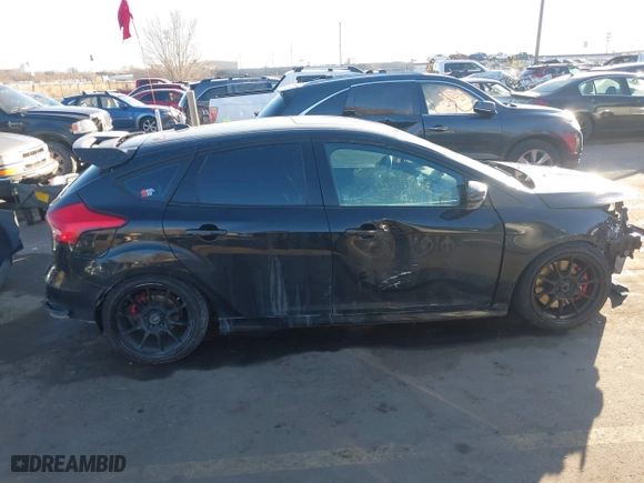 2015 Ford Focus ST with VIN 1FADP3L95FL339181, listed as a IAAI auction lot 41397051 with 124,656 mi miles. Bid and sale history available at carsss.com. Image 14.