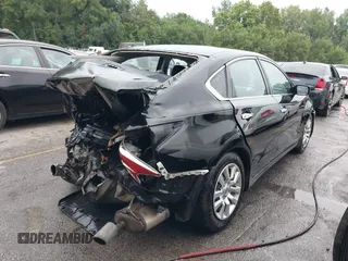 2015 Nissan Altima S with VIN 1N4AL3AP4FC184879, listed as a IAAI auction lot 40097666 with 128,156 mi miles and . Bid and sale history available at DreamBid. Image 4.