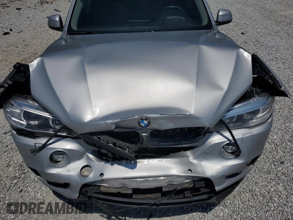 2015 BMW X5 xDrive35i z VIN 5UXKR0C52F0P12247, wystawiony jako Copart lot #54955465 z przebiegiem 87 315 mil mil oraz Szkoda całkowita • Salvage title. Historia ofert i sprzedaży dostępna na DreamBid. Obrazek 12.