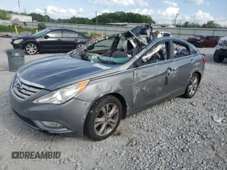 2013 Hyundai Sonata Limited with VIN 5NPEC4AC1DH580090, listed as a Copart auction lot 53973275 with Not Provided miles and Salvage Title. Bid and sale history available at DreamBid. Image 1.