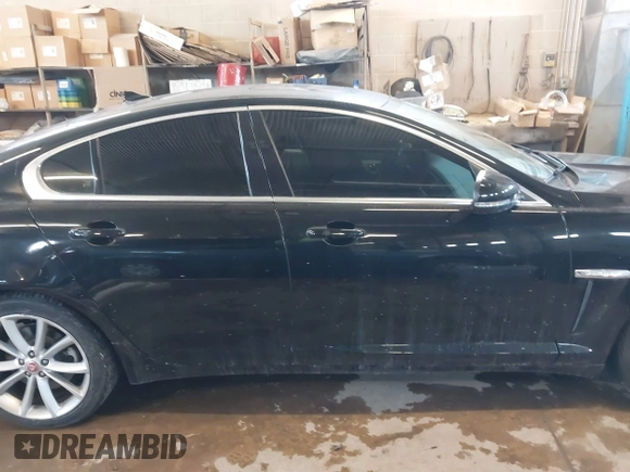 2015 Jaguar XF V6 Portfolio with VIN SAJWJ0FF5F8U57756, listed as a IAAI auction lot 41631278 with 47,158 mi miles. Bid and sale history available at carsss.com. Image 13.