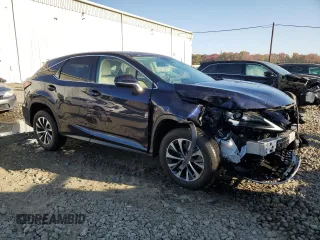2022 Lexus RX 350 with VIN 2T2AZMDA2NC313743, listed as a Copart auction lot 76804154 with 9,503 mi miles and Salvage title. Bid and sale history available at DreamBid. Image 4.