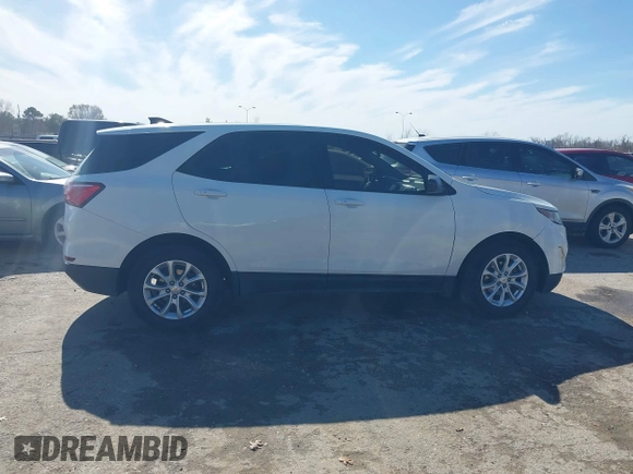 2018 Chevrolet Equinox LS with VIN 2GNAXHEV7J6293821, listed as a IAAI auction lot 41475150 with 80,785 mi miles and . Bid and sale history available at DreamBid. Image 13.