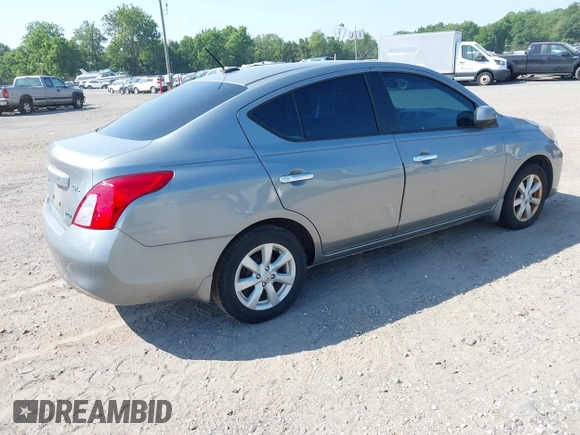 2012 Nissan Versa SV with VIN 3N1CN7AP2CL945917, listed as a IAAI auction lot 42608281 with 142,592 mi miles and . Bid and sale history available at DreamBid. Image 4.