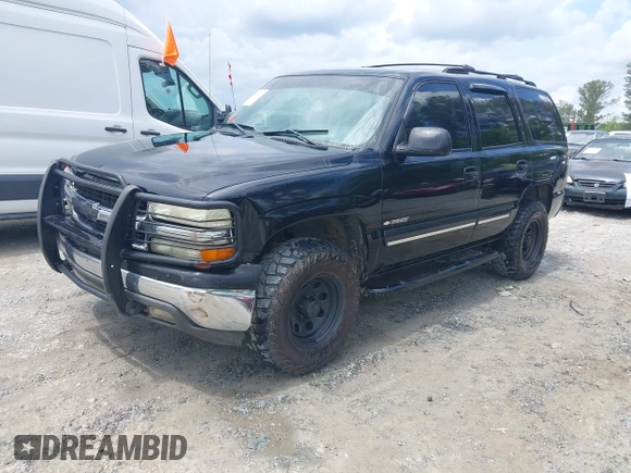 2002 Chevrolet Tahoe LS with VIN 1GNEC13V12J329045, listed as a IAAI auction lot 42099926 with 266,291 mi miles and . Bid and sale history available at DreamBid. Image 2.