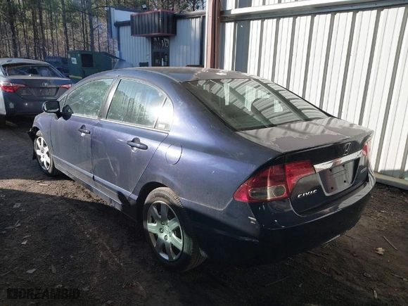 2009 Honda Civic Sdn LX with VIN 2HGFA16559H544472, listed as a IAAI auction lot 41695513 with 124,845 mi miles. Bid and sale history available at carsss.com. Image 3.
