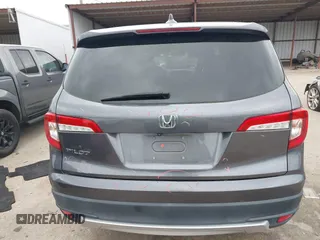 2020 Honda Pilot EX-L z VIN 5FNYF5H5XLB016632, wystawiony jako IAAI lot #41968994 z przebiegiem 75 540 mil mil oraz . Historia ofert i sprzedaży dostępna na DreamBid. Obrazek 16.