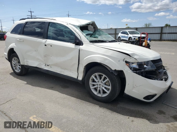 2018 Dodge Journey SXT with VIN 3C4PDDBG6JT141759, listed as a Copart auction lot 53974645 with 142,335 mi miles and Salvage title. Bid and sale history available at DreamBid. Image 4.