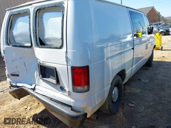 1999 Ford Econoline Cargo with VIN 1FTRE14W0XHB64440, listed as a IAAI auction lot 41645551 with 239,114 mi miles. Bid and sale history available at carsss.com. Image 4.