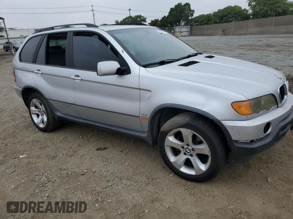 2003 BMW X5 3.0i with VIN 5UXFA53573LV98293, listed as a Copart auction lot 69780404 with 0 mi miles and Salvage Title. Bid and sale history available at carsss.com. Image 4.