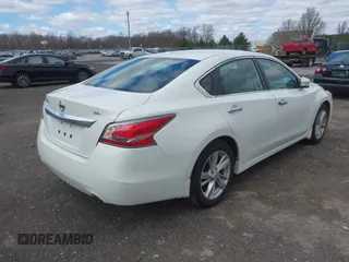 2015 Nissan Altima S with VIN 1N4AL3AP4FN860932, listed as a IAAI auction lot 42088842 with 138,119 mi miles and . Bid and sale history available at DreamBid. Image 4.