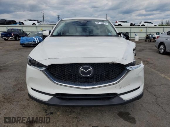 2018 Mazda CX-5 Grand Touring z VIN JM3KFBDM6J0447165, wystawiony jako Copart lot #56133015 z przebiegiem 80 579 mil mil oraz Szkoda całkowita • Salvage title. Historia ofert i sprzedaży dostępna na DreamBid. Obrazek 5.