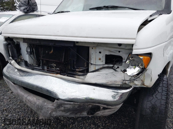 2004 Ford Econoline Cargo with VIN 1FTSS34L84HA56056, listed as a IAAI auction lot 41235862 with 215,095 mi miles and . Bid and sale history available at DreamBid. Image 6.