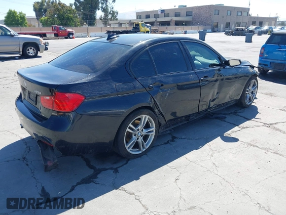 2014 BMW 3 Series 328i with VIN WBA3C1C54EK112620, listed as a IAAI auction lot 42712414 with 169,297 mi miles and . Bid and sale history available at DreamBid. Image 4.
