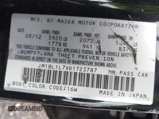 2013 Mazda 3 i Touring with VIN JM1BL1L7XD1723787, listed as a IAAI auction lot 42644276 with 150,745 mi miles and . Bid and sale history available at DreamBid. Image 9.