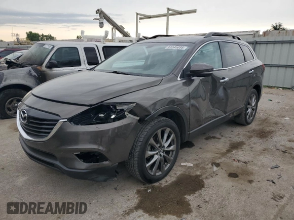 2015 Mazda CX-9 Grand Touring z VIN JM3TB2DA0F0468350, wystawiony jako Copart lot #61545095 z przebiegiem 154 050 mil mil oraz Szkoda całkowita • Salvage title. Historia ofert i sprzedaży dostępna na DreamBid. Obrazek 1.