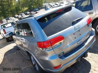 2014 Jeep Grand Cherokee Overland with VIN 1C4RJFCM4EC316142, listed as a IAAI auction lot 40607061 with 195,008 mi miles. Bid and sale history available at carsss.com. Image 3.