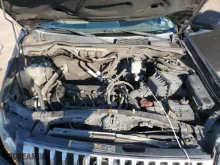 2009 Mercury Mariner Premier with VIN 4M2CU87759KJ12730, listed as a Copart auction lot 80387704 with 256,729 mi miles and Salvage Title. Bid and sale history available at carsss.com. Image 12.